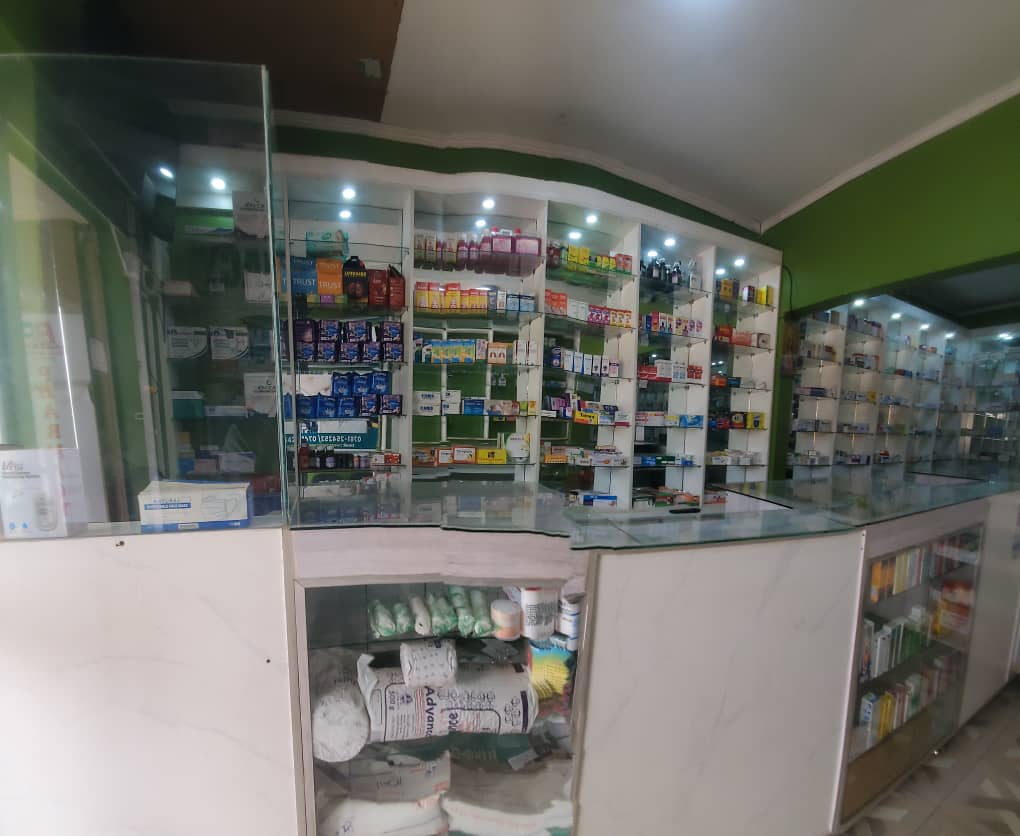 Bweza Pharmacy product shelves and dispensing counter